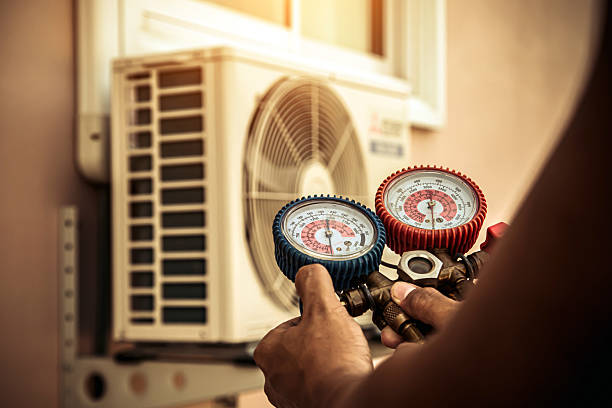 Professional Heat Pump Repair technician working in Solsville, NY